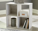 Ashley Furniture Paxberry Four Cube Organizer with wood finish and open cube compartments for versatile storage.