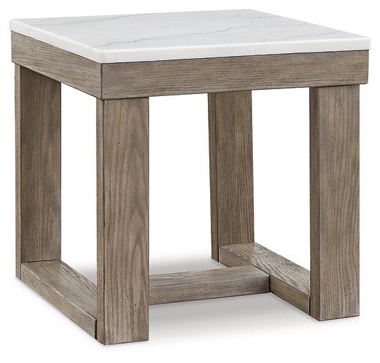 Ashley Furniture Loyaska End Table with wood finish and modern design, featuring a smooth surface and sturdy legs.