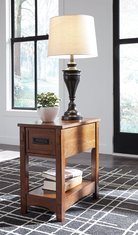 Ashley Furniture Breegin chairside end table with a wooden surface and storage shelf, designed for convenient living room use.