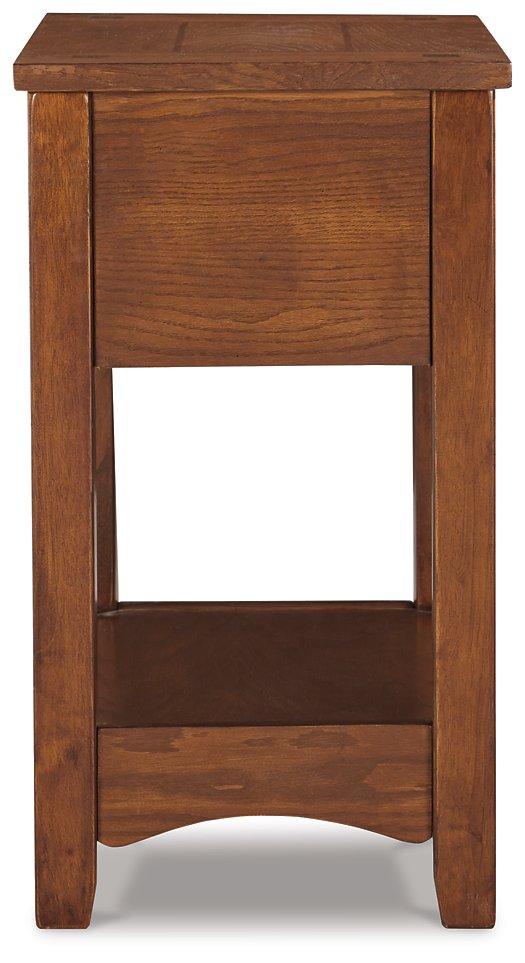 Ashley Furniture Breegin chairside end table featuring a wooden surface and sleek design for living room convenience.