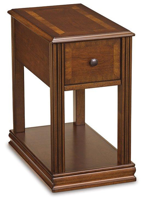 Ashley Furniture Breegin chairside end table with a modern wooden design, featuring a compact surface and sleek legs.