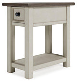 Ashley Furniture Bolanburg chairside end table with a wood finish and compact design, perfect for small living spaces.