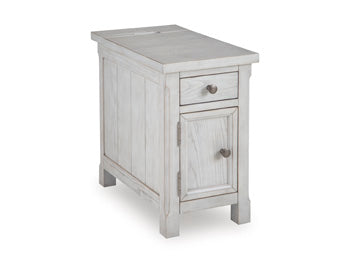 Ashley Furniture Robbinsdale chairside end table with a dark wood finish, shown at an angle highlighting its compact design.