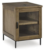 Ashley Furniture Torlanta chairside end table with a modern wood finish and compact design, perfect for small spaces.