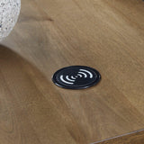 Ashley Furniture Torlanta chairside end table with a wooden top and black metal frame, perfect for living room use.