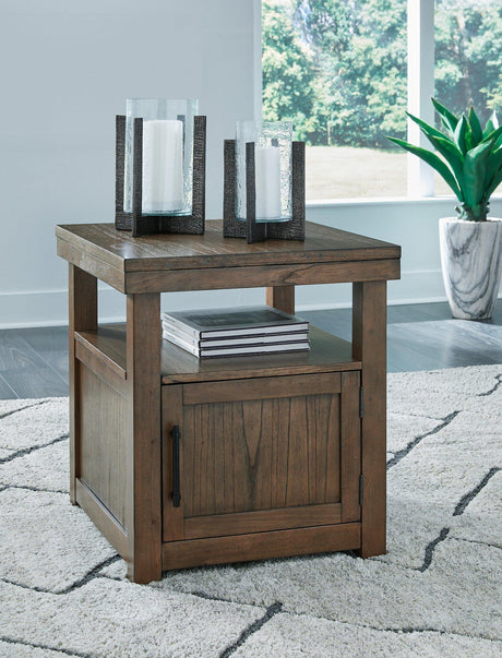 Ashley Furniture Boardernest End Table with a wooden finish, featuring a compact tabletop and lower shelf for storage.