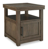 Ashley Furniture Boardernest end table with a wooden top and metal legs, stylish and functional for living room decor.
