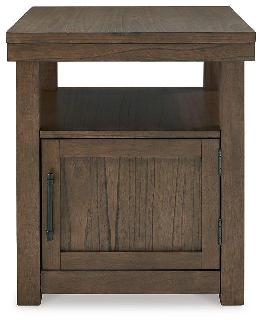 Ashley Furniture Boardernest End Table with a wooden top and tapered legs, ideal for living room or bedroom decor.
