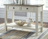 Ashley Furniture Bolanburg end table, console style with wood finish, featuring a sleek tabletop and storage shelf.