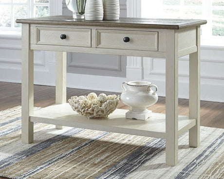 Ashley Furniture Bolanburg end table, console style with wood finish, featuring a sleek tabletop and storage shelf.