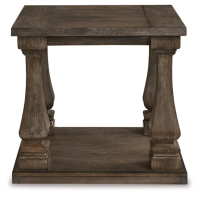 Ashley Furniture Johnelle end table with a wooden top and tapered legs, shown from a head-on angle.