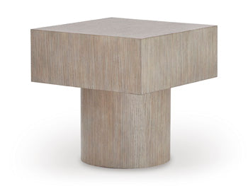 Ashley Furniture Jorielyn end table with a modern design, featuring a smooth wooden surface and sleek metal legs.