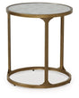 Ashley Furniture Korajane end table with a round wooden top and tapered legs, shown from an angled side view.