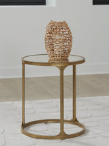Ashley Furniture Korajane end table with a wood finish and modern design, featuring a smooth surface and sturdy legs.