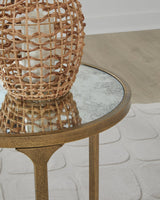 Close-up of Ashley Furniture Korajane End Table showing wood finish and detailed design elements.