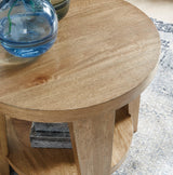 Ashley Furniture Kristiland end table with a sleek wooden surface and modern design, perfect for living room or bedroom decor.