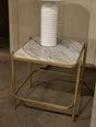 Ashley Furniture Manor Stone End Table with a sturdy wooden top and tapered legs, ideal for living room or bedroom decor.