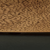 Ashley Furniture Noraluna End Table with wood finish, featuring a sleek tabletop and storage drawer in a modern design.