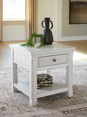 Ashley Furniture Robbinsdale end table with a square top and wooden finish, shown in a close-up cropped image.