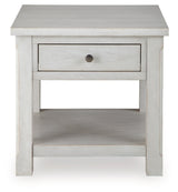 Ashley Furniture Robbinsdale End Table with a dark wood finish and sleek design, shown in a head-on view.