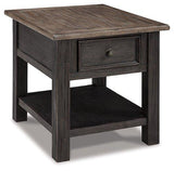 Ashley Furniture Tyler Creek End Table showing a wooden surface with rustic finish and sturdy legs for living room decor.