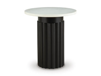 Ashley Furniture Wainstone Accent End Table with a sleek surface and modern design, perfect for living room decor.
