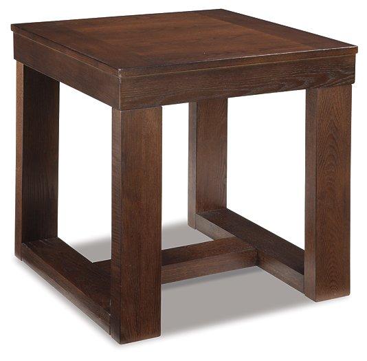 Ashley Furniture Watson End Table with a sleek wooden surface and modern design, perfect for living room decor.