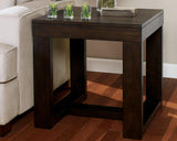 Ashley Furniture Watson End Table with a sleek wooden surface and modern design, perfect for living room decor.