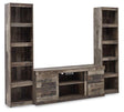 Derekson 3-piece entertainment center by Ashley Furniture with TV stand and storage cabinets in a modern living room setting.