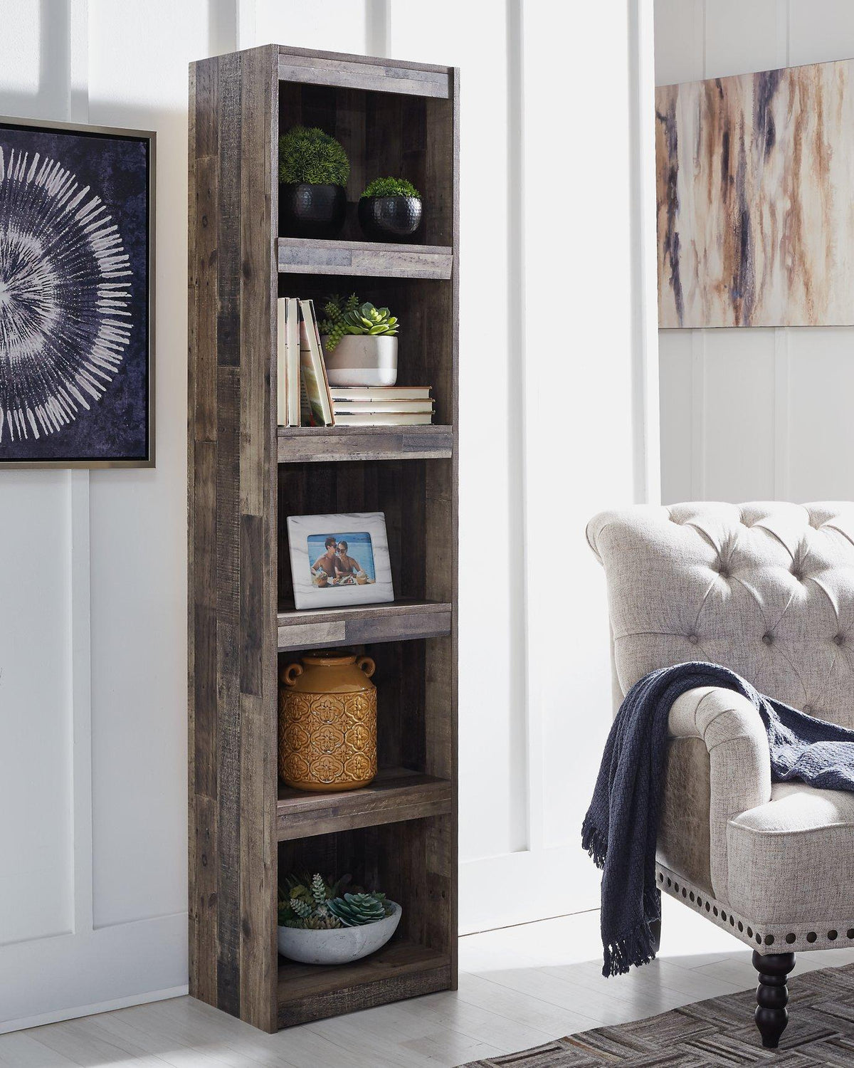Derekson 3-piece entertainment center by Ashley Furniture featuring TV stand, side shelves, and storage compartments.
