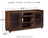 Ashley Furniture Starmore 3-Piece Entertainment Center with TV stand, shelves, and storage cabinets in warm wood finish.