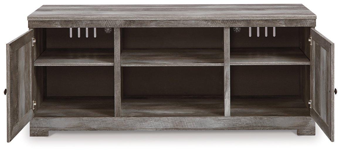 Ashley Wynnlow 63-inch TV stand entertainment center with open shelving and storage compartments in a modern wood finish.