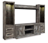 Wynnlow 4-piece entertainment center by Ashley Furniture featuring a modern design with TV stand, storage cabinets, and shelves.