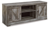 Ashley Furniture Wynnlow 4-piece entertainment center with TV stand, storage cabinets, and open shelving in a modern design.