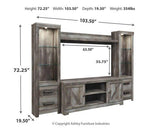 Ashley Furniture Wynnlow 4-piece entertainment center with TV stand, shelves, and storage cabinets in a modern living room setting.