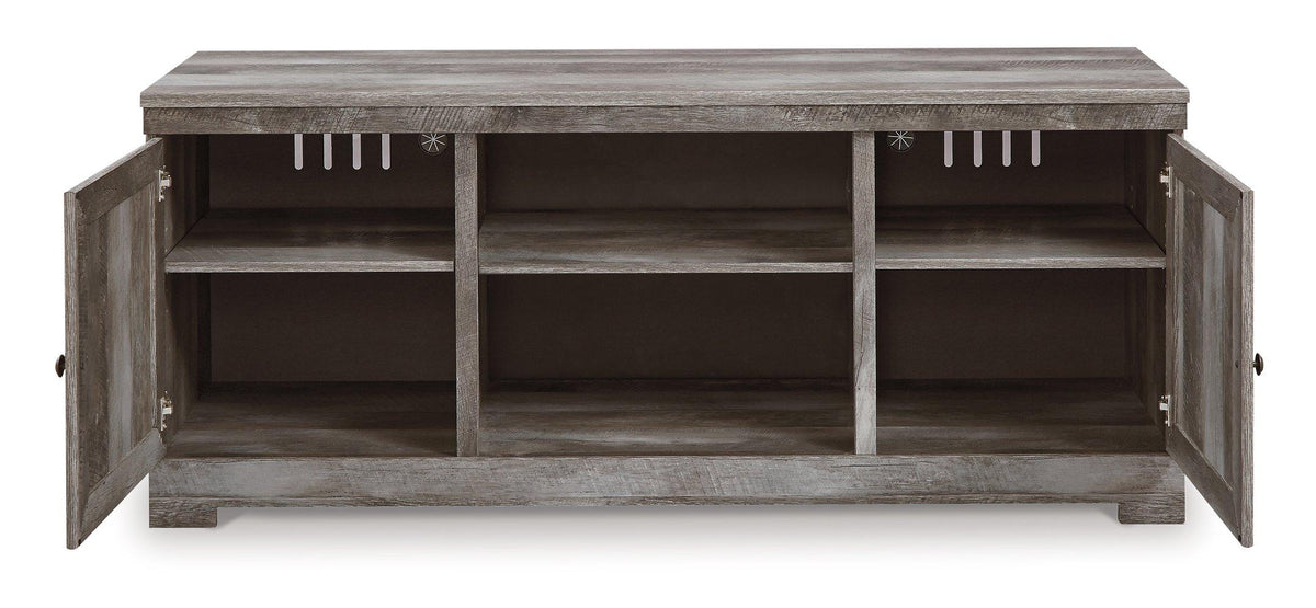 Ashley Furniture Wynnlow 4-piece entertainment center with TV stand, shelves, and storage cabinets in a modern wood finish.
