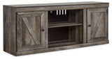 Ashley Wynnlow 4-piece entertainment center with TV stand, shelves, and storage cabinets in a modern wood finish.