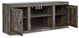 Ashley Wynnlow 4-piece entertainment center with TV stand, storage cabinets, and open shelving for living room decor.