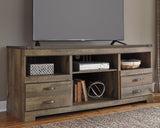 Ashley Furniture Trinell 4-piece entertainment center with electric fireplace, showcasing modern design and ample storage space.