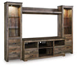 Ashley Furniture Trinell 4-Piece Entertainment Center with shelves, cabinets, and TV stand in a modern living room setup.