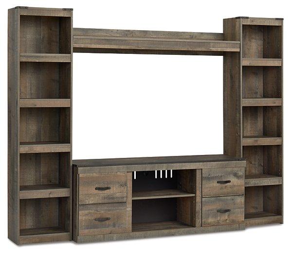 Ashley Furniture Trinell 4-Piece Entertainment Center with TV stand, shelves, and storage units in a modern design.