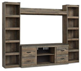 Ashley Furniture Trinell 4-Piece Entertainment Center with TV stand, shelves, and storage units in a modern design.