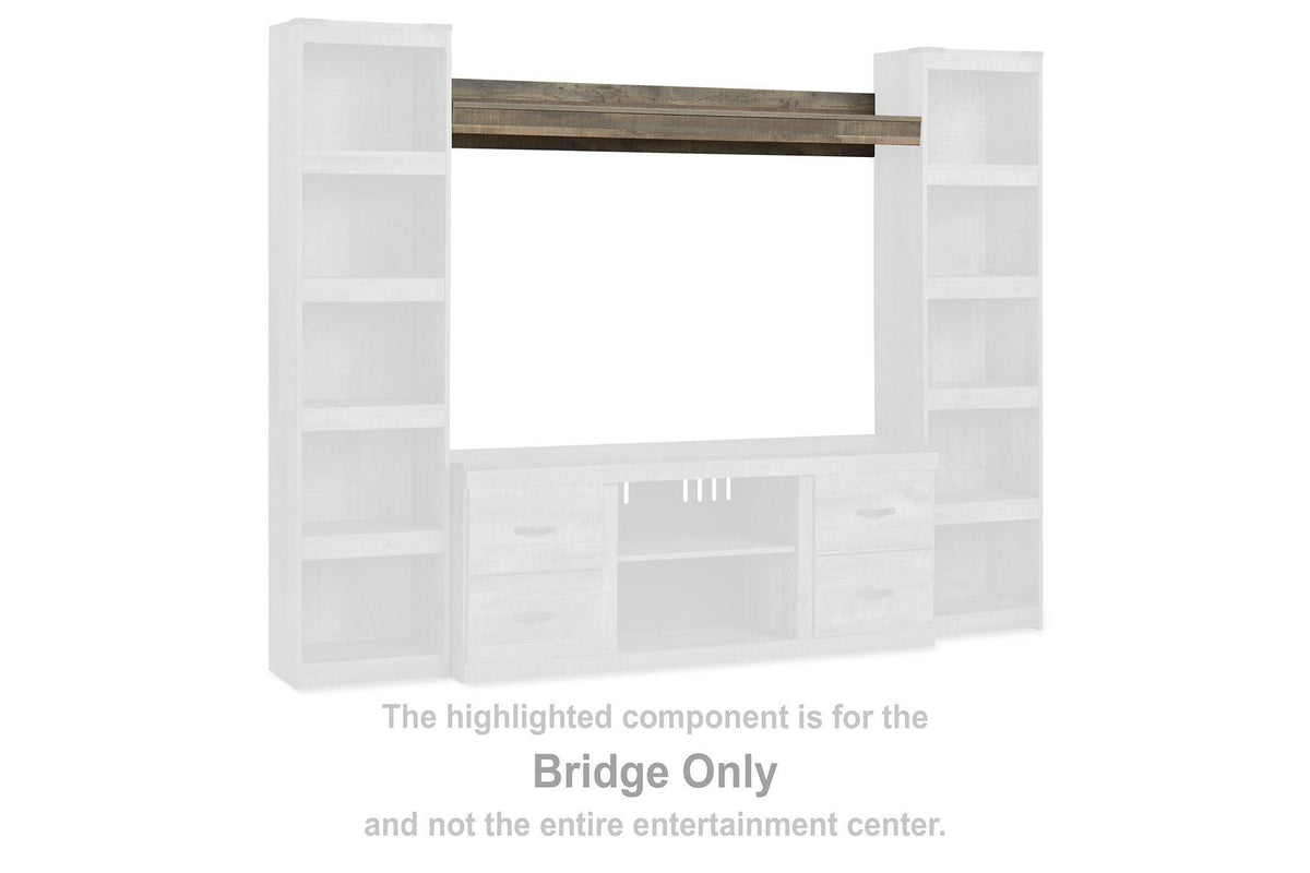 Ashley Furniture Trinell 4-Piece Entertainment Center with TV stand, shelves, and storage cabinets in a modern design.