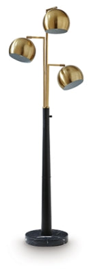 Ashley Furniture Sorcha Floor Lamp with a sleek design and fabric shade, standing on a wooden base in a modern living room setting.