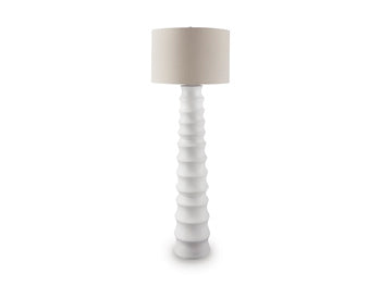 Ashley Veraleigh floor lamp with a tall, elegant design and a fabric shade, perfect for living room or bedroom lighting.