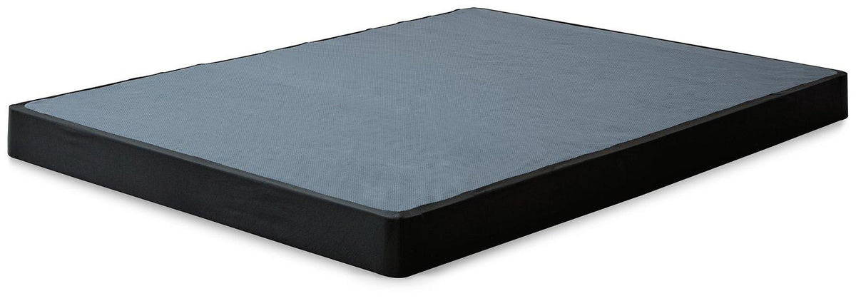 Low profile Ashley Furniture box spring foundation for support, shown in a clean, neutral-toned bedroom setting.