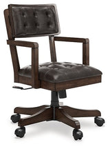 Ashley Furniture Breckington Home Office Set with desk, chair, and storage in a modern design, shown from an angled view.
