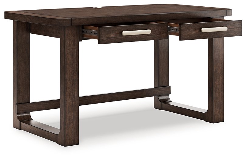 Ashley Furniture Breckington Home Office Set with adjustable desk, ergonomic chair, and storage cabinets in a modern workspace.