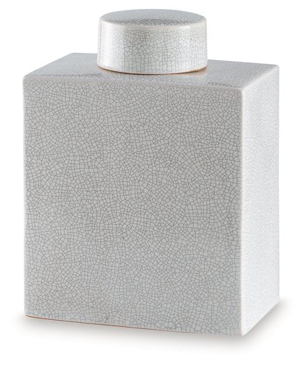 Ashley Furniture Haddworth jar with a decorative ceramic design, showcased from an angled view in this image.