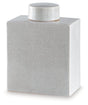 Ashley Furniture Haddworth jar with a decorative ceramic design, showcased from an angled view in this image.